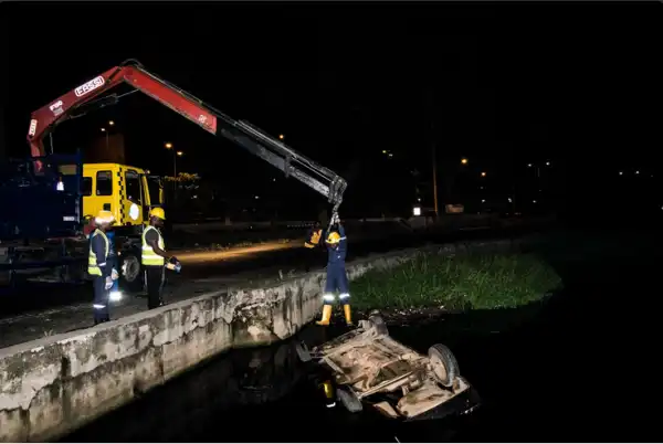 Man And Over Speedy Car Ran into A Canal In Lagos {See Photos}